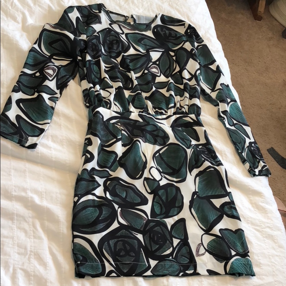 Form fitting dress with open back